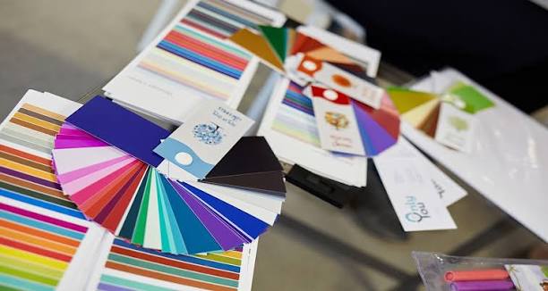 Custom printing services including packaging, clothing, signs, and promotional materials