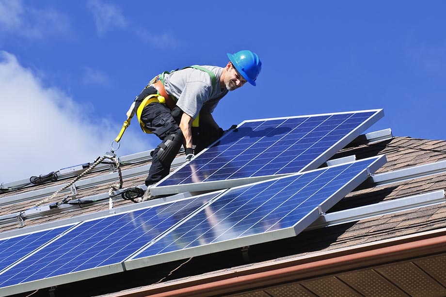 Engineer reviewing a solar energy system design