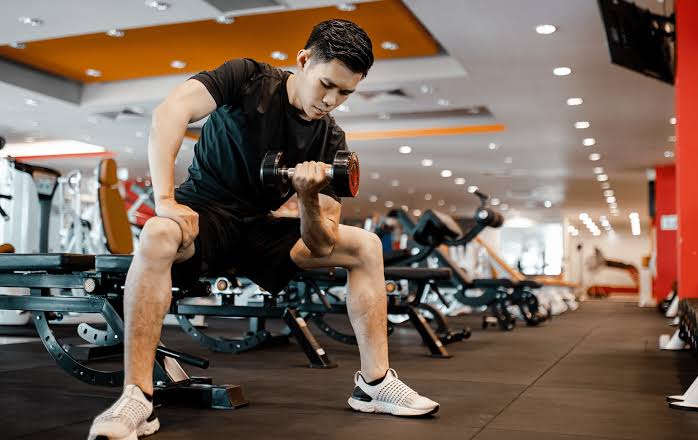 Small group fitness session with personal trainer in a modern studio