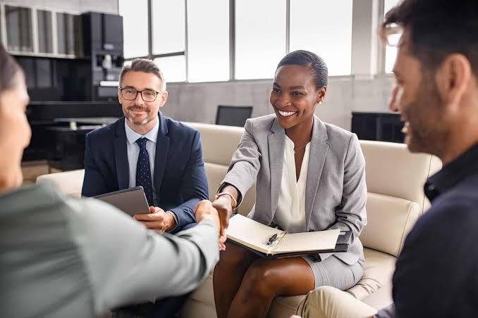 Business team interviewing a candidate in a modern office