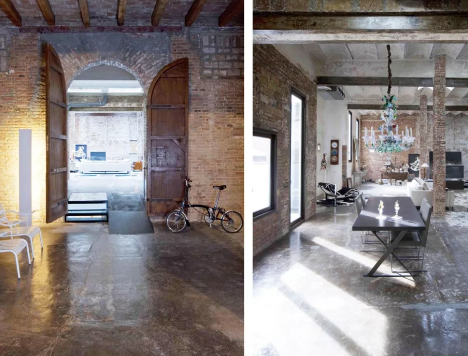 Industrial loft interior with exposed brick and steel in France